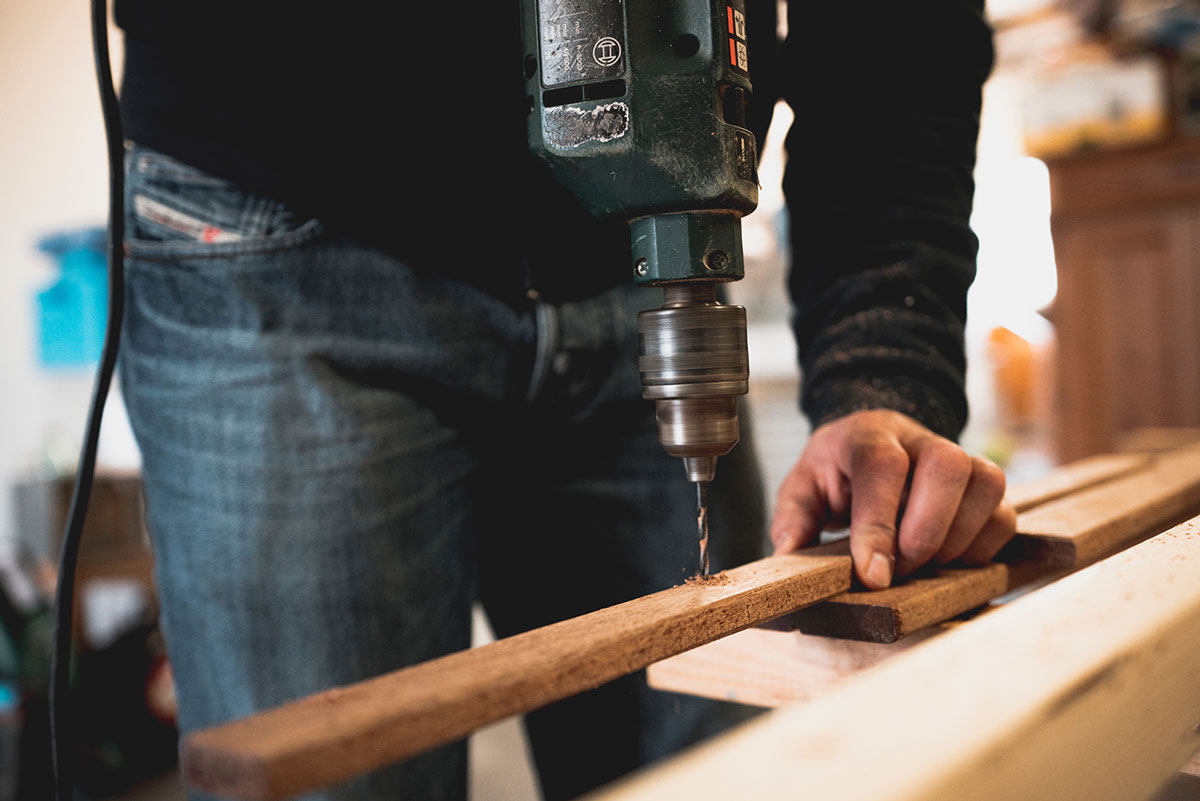 Man drilling wood